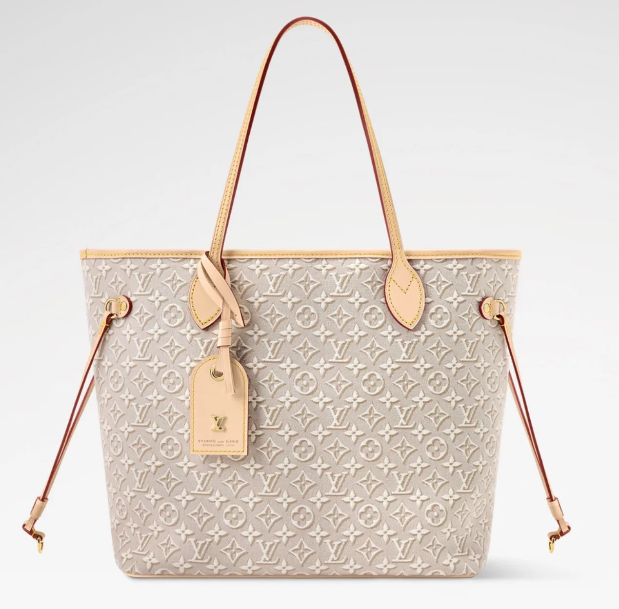 Louis Vuitton Neverfull MM: Tote-Bag aus Monogram-Empreinte-Leder in Helltaupe mit hellen Lederhenkeln.